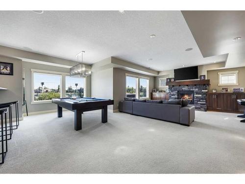 371 Chapala Point Se, Calgary, AB - Indoor Photo Showing Other Room With Fireplace