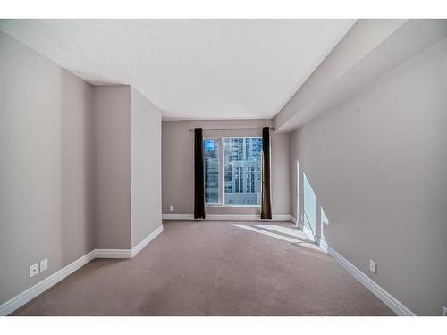 1007-920 5 Avenue Sw, Calgary, AB - Indoor Photo Showing Other Room