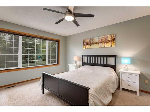 75 Hawkstone Close Nw, Calgary, AB - Indoor Photo Showing Bedroom