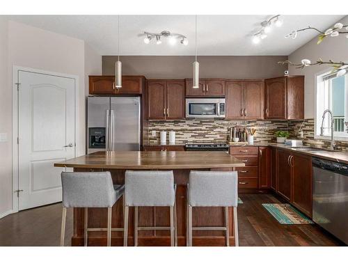 85 Silverado Skies Crescent Sw, Calgary, AB - Indoor Photo Showing Kitchen With Stainless Steel Kitchen With Double Sink With Upgraded Kitchen