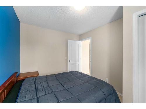 85 Silverado Skies Crescent Sw, Calgary, AB - Indoor Photo Showing Bedroom