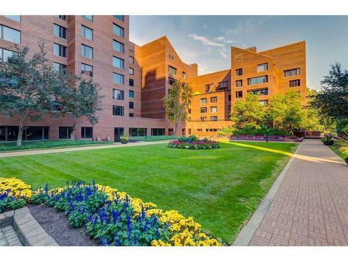 202C-500 Eau Claire Avenue Sw, Calgary, AB - Outdoor With Balcony With Facade