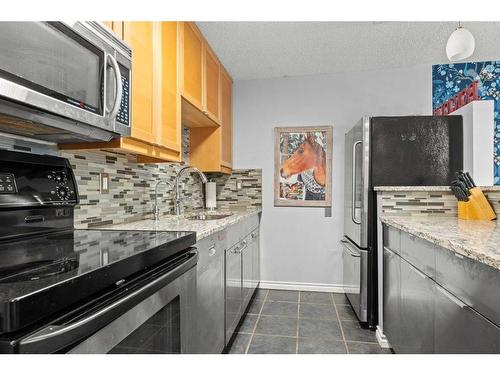 103-1111 13 Avenue Sw, Calgary, AB - Indoor Photo Showing Kitchen