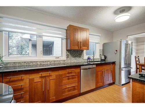 14127 Parkside Drive Se, Calgary, AB - Indoor Photo Showing Kitchen With Stainless Steel Kitchen