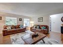 14127 Parkside Drive Se, Calgary, AB  - Indoor Photo Showing Living Room 