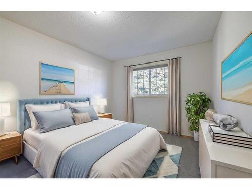 933 Drury Avenue Ne, Calgary, AB - Indoor Photo Showing Bedroom