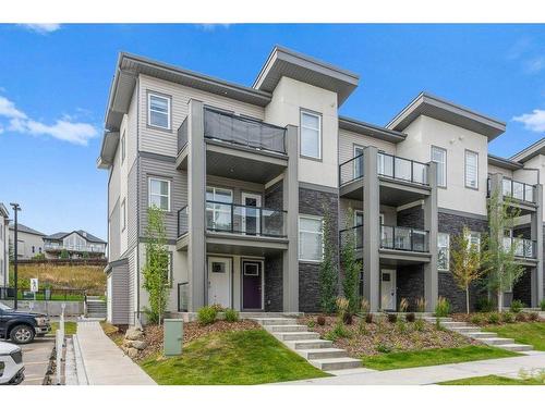 122 Spring Creek Common Sw, Calgary, AB - Outdoor With Facade