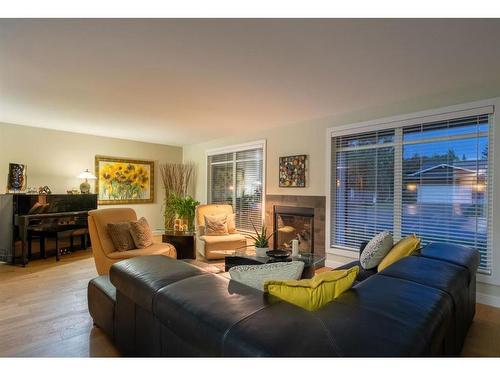 1108 Lake Placid Drive Se, Calgary, AB - Indoor Photo Showing Living Room With Fireplace