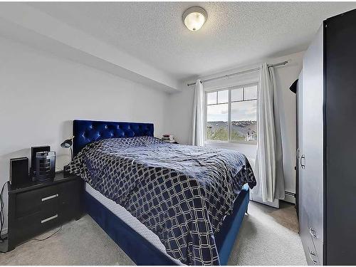 2304-60 Panatella Street Nw, Calgary, AB - Indoor Photo Showing Bedroom