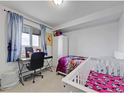 2304-60 Panatella Street Nw, Calgary, AB - Indoor Photo Showing Bedroom