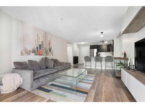 2213-16969 24 Street Sw, Calgary, AB - Indoor Photo Showing Living Room