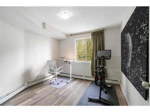 2213-16969 24 Street Sw, Calgary, AB - Indoor Photo Showing Gym Room