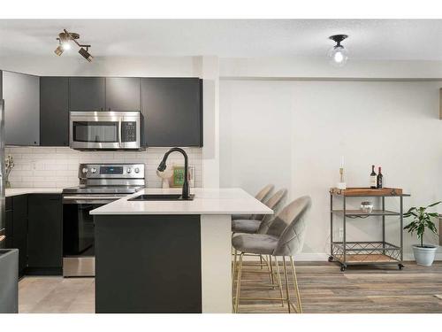 2213-16969 24 Street Sw, Calgary, AB - Indoor Photo Showing Kitchen With Upgraded Kitchen