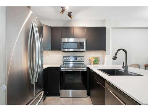 2213-16969 24 Street Sw, Calgary, AB - Indoor Photo Showing Kitchen With Stainless Steel Kitchen With Upgraded Kitchen