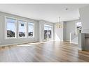 111 Seton Row Se, Calgary, AB  - Indoor Photo Showing Living Room 