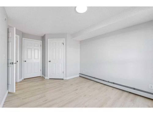 212-5555 Falsbridge Drive Ne, Calgary, AB - Indoor Photo Showing Other Room