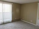 302-280 Banister Drive, Okotoks, AB  - Indoor Photo Showing Other Room 