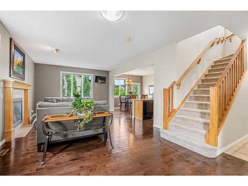 14 Rockyspring Point Nw, Calgary, AB - Indoor Photo Showing Other Room With Fireplace