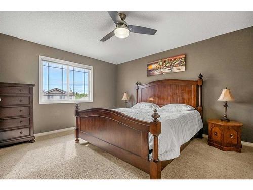 14 Rockyspring Point Nw, Calgary, AB - Indoor Photo Showing Bedroom