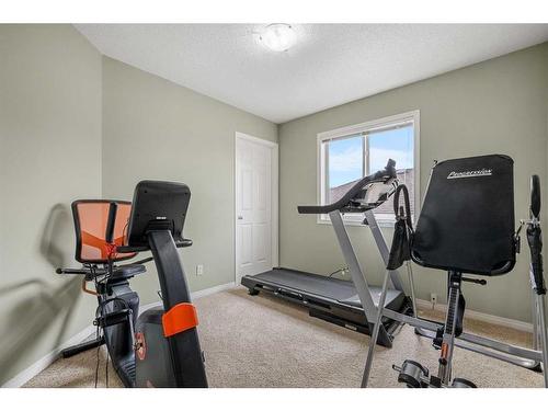 14 Rockyspring Point Nw, Calgary, AB - Indoor Photo Showing Gym Room