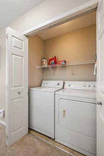 14 Rockyspring Point Nw, Calgary, AB - Indoor Photo Showing Laundry Room