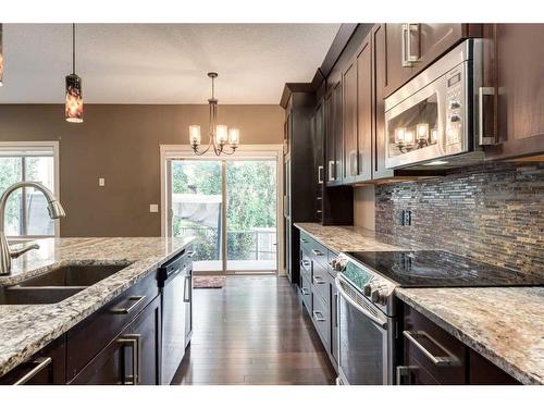 532 Everbrook Way Sw, Calgary, AB - Indoor Photo Showing Kitchen With Double Sink With Upgraded Kitchen