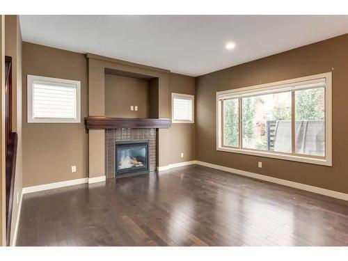 532 Everbrook Way Sw, Calgary, AB - Indoor Photo Showing Living Room With Fireplace