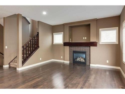 532 Everbrook Way Sw, Calgary, AB - Indoor Photo Showing Living Room With Fireplace