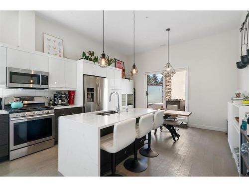 113-15 Rosscarrock Gate Sw, Calgary, AB - Indoor Photo Showing Kitchen With Stainless Steel Kitchen With Double Sink With Upgraded Kitchen