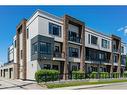 113-15 Rosscarrock Gate Sw, Calgary, AB  - Outdoor With Balcony With Facade 