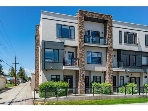 113-15 Rosscarrock Gate Sw, Calgary, AB - Outdoor With Balcony With Facade