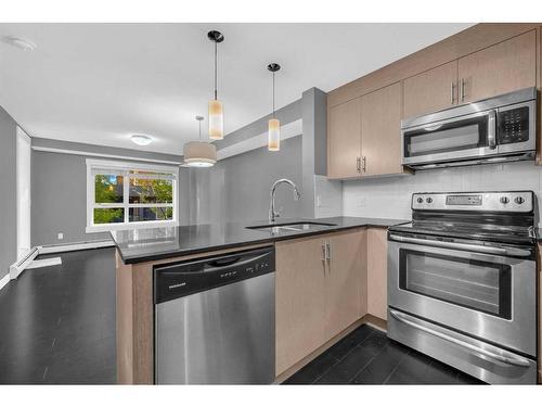 3203-240 Skyview Ranch Road Ne, Calgary, AB - Indoor Photo Showing Kitchen With Stainless Steel Kitchen With Double Sink With Upgraded Kitchen