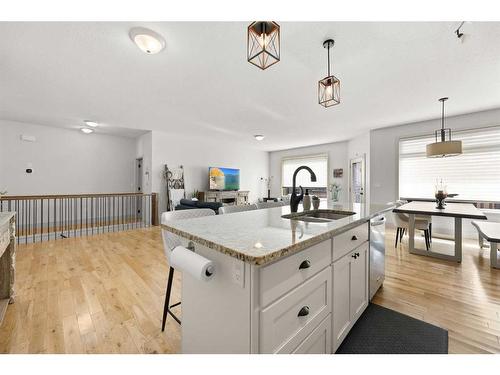 53 Sandpiper Drive, Didsbury, AB - Indoor Photo Showing Kitchen With Double Sink