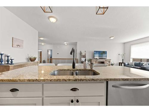 53 Sandpiper Drive, Didsbury, AB - Indoor Photo Showing Kitchen With Double Sink With Upgraded Kitchen