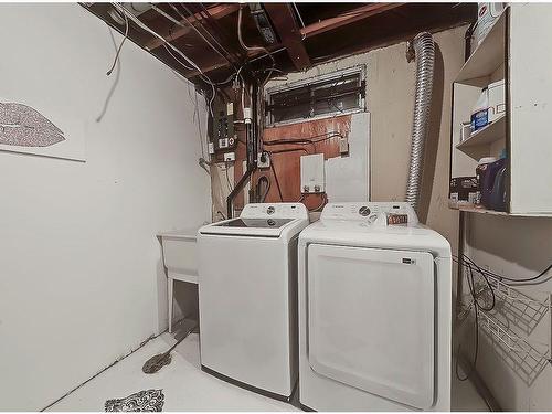 36 Oakbury Place Sw, Calgary, AB - Indoor Photo Showing Laundry Room