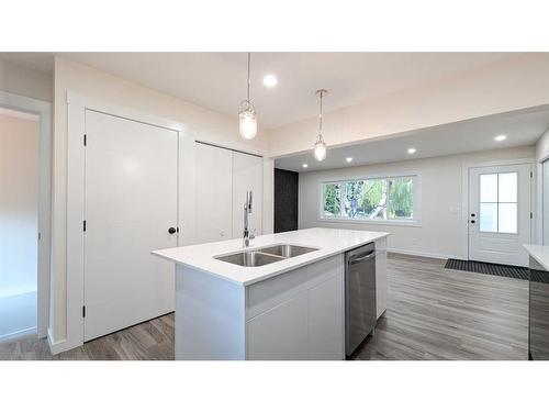 8232 5 Street Sw, Calgary, AB - Indoor Photo Showing Kitchen With Double Sink With Upgraded Kitchen