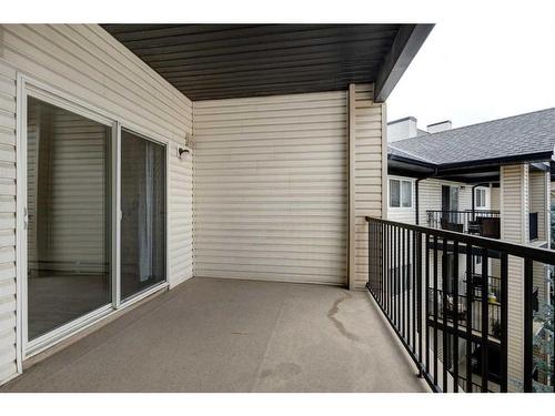 1409-4975 130 Avenue Se, Calgary, AB - Outdoor With Deck Patio Veranda With Exterior