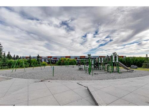 116 Shawnee Common Sw, Calgary, AB - Outdoor