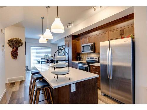 116 Shawnee Common Sw, Calgary, AB - Indoor Photo Showing Kitchen With Upgraded Kitchen