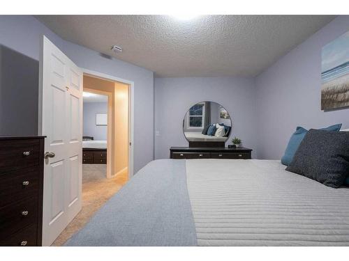 82 Evansmeade Circle Nw, Calgary, AB - Indoor Photo Showing Bedroom