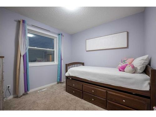 82 Evansmeade Circle Nw, Calgary, AB - Indoor Photo Showing Bedroom