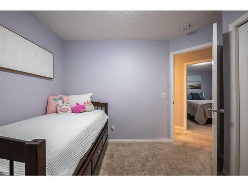 82 Evansmeade Circle Nw, Calgary, AB - Indoor Photo Showing Bedroom