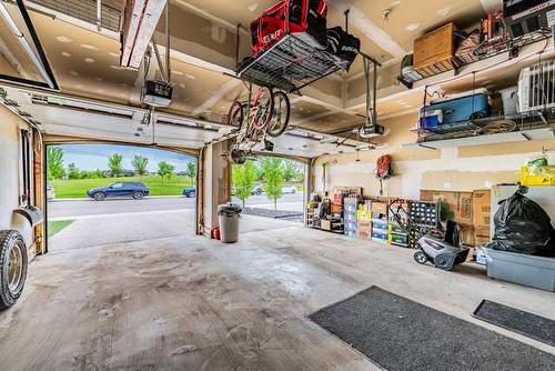 1093 Coopers Drive Sw, Airdrie, AB - Indoor Photo Showing Garage