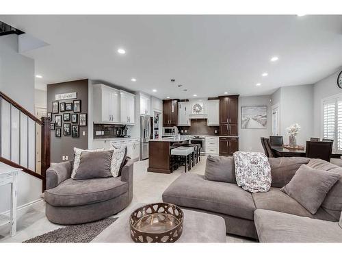 1093 Coopers Drive Sw, Airdrie, AB - Indoor Photo Showing Living Room