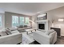 32 Chaparral Valley Terrace Se, Calgary, AB  - Indoor Photo Showing Living Room With Fireplace 