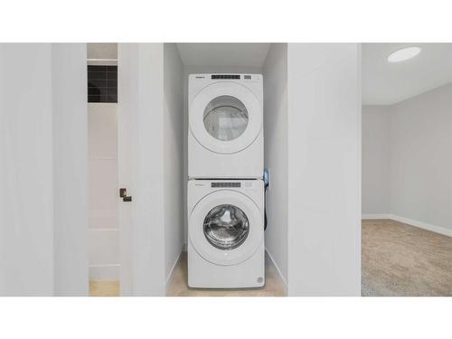 89 Corner Glen Row Ne, Calgary, AB - Indoor Photo Showing Laundry Room