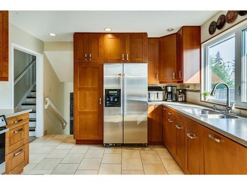 11008 Braton Place Sw, Calgary, AB - Indoor Photo Showing Kitchen With Stainless Steel Kitchen With Double Sink