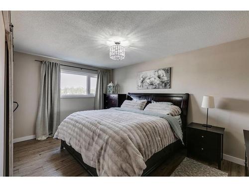 11008 Braton Place Sw, Calgary, AB - Indoor Photo Showing Bedroom