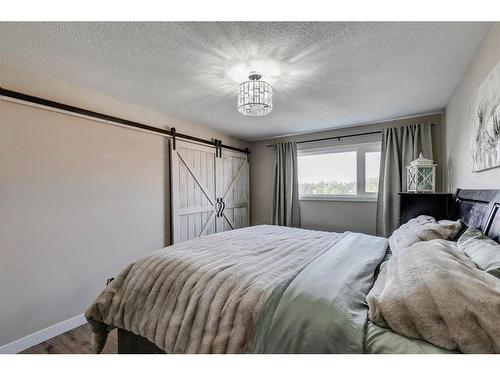 11008 Braton Place Sw, Calgary, AB - Indoor Photo Showing Bedroom