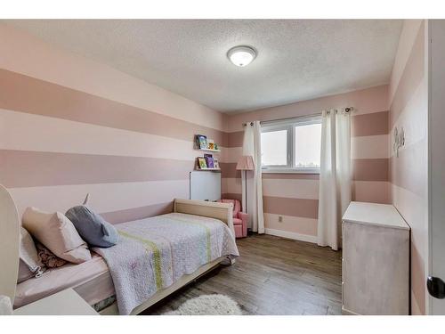 11008 Braton Place Sw, Calgary, AB - Indoor Photo Showing Bedroom